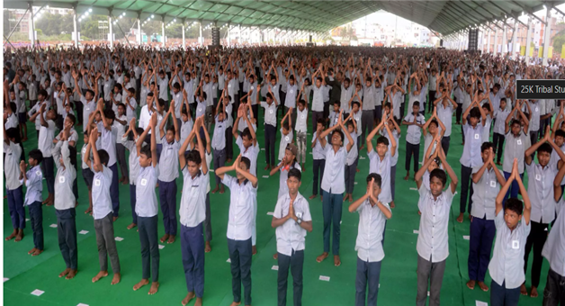 Khabar Odisha:22000-tribal-students-sets-world-record-doing-108-surya-namaskar