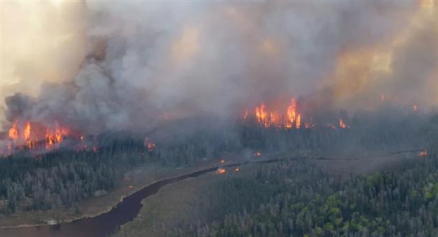 Khabar Odisha:Canada-wildfires-uncontrollable-blazes-force-mass-evacuations