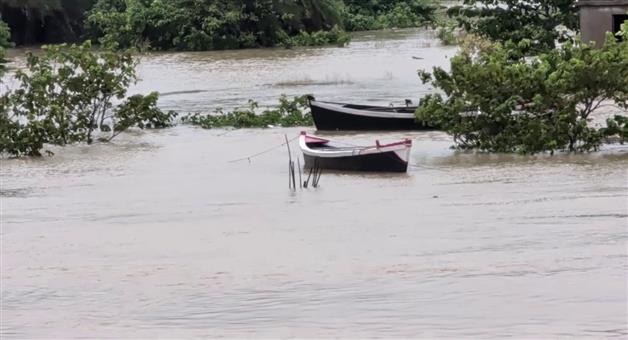 Khabar Odisha:Floodwaters-of-the-Budhabalanga-River-above-the-danger-mark