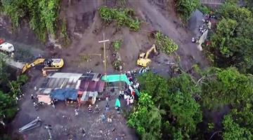 Khabar Odisha:Landslide-buries-bus-in-Colombia-killing-at-least-34