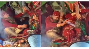 Khabar Odisha:Nation-Angry-bride-beat-up-the-groom-relatives-kept-smiling-trending-video-viral