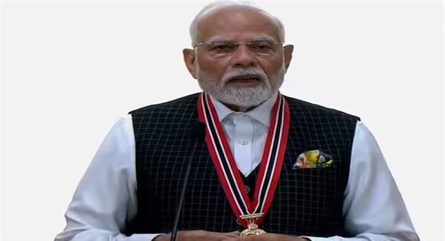 Khabar Odisha:PM-Modi-conferred-with-Trinidad-and-Tobagos-highest-civilian-honour-says-it-is-a-testament-to-our-relationship