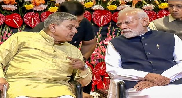 Khabar Odisha:PM-Modi-releases-postage-stamps-and-stamps-to-mark-100-years-of-RSS