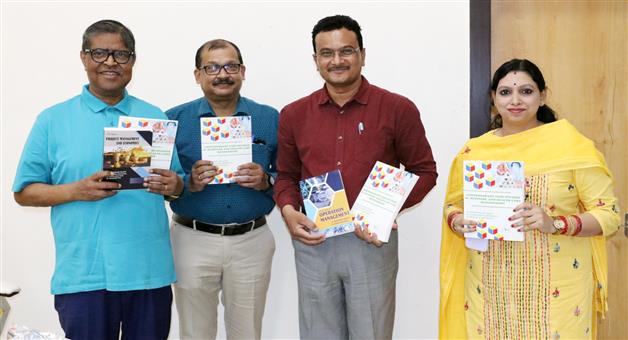 Khabar Odisha:The-book-was-launched-by-the-Founder-President-of-Education-and-Research-SOA