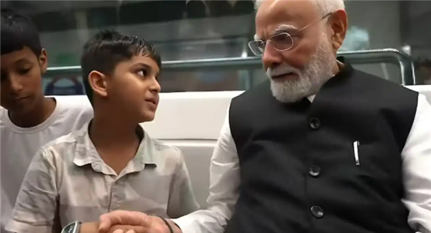 Khabar Odisha:pm-modi-delhi-metro-ride-du-srcc-centenary-celebrations