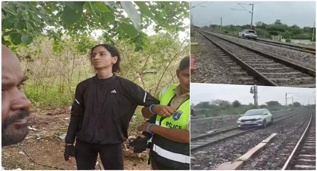 Khabar Odisha:report-telangana-railway-track-video-woman-drives-car-on-railway-track-ranga-reddy-district-15-trains-diverted-video-goes-viral-on-social-media-telangana-police-arrest-her